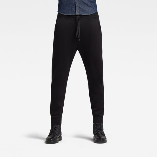 Men’s Sustainably Made Cotton Black Tracksuit Bottom Joggers with a cuffed hem from G-Star RAW available at StylishGuy Menswear Dublin